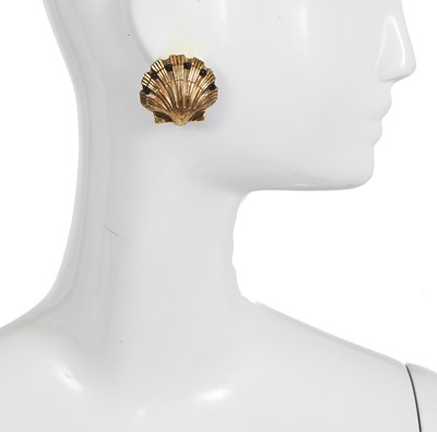 Lot 59 - A pair of Chanel by Goossens gilt shell earrings, 1970s