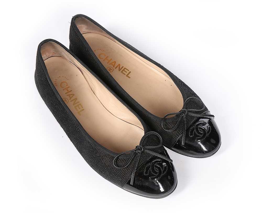 Lot 129 - A pair of Chanel black rubberised cotton...