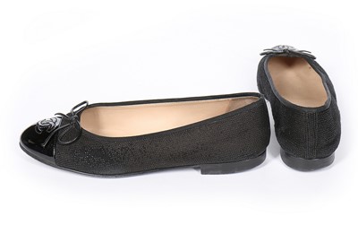 Lot 129 - A pair of Chanel black rubberised cotton...