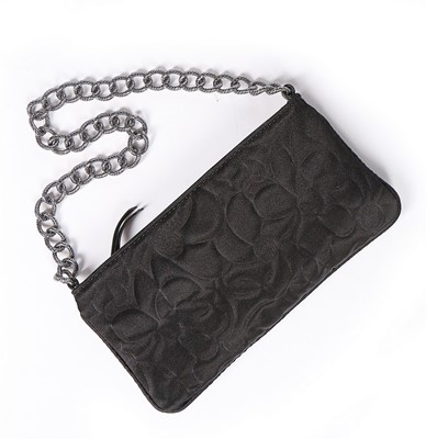 Lot 130 - A Chanel satin mini-bag with chain strap,...