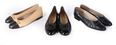 Lot 303 - Three pairs of Chanel pumps, modern, stamped...