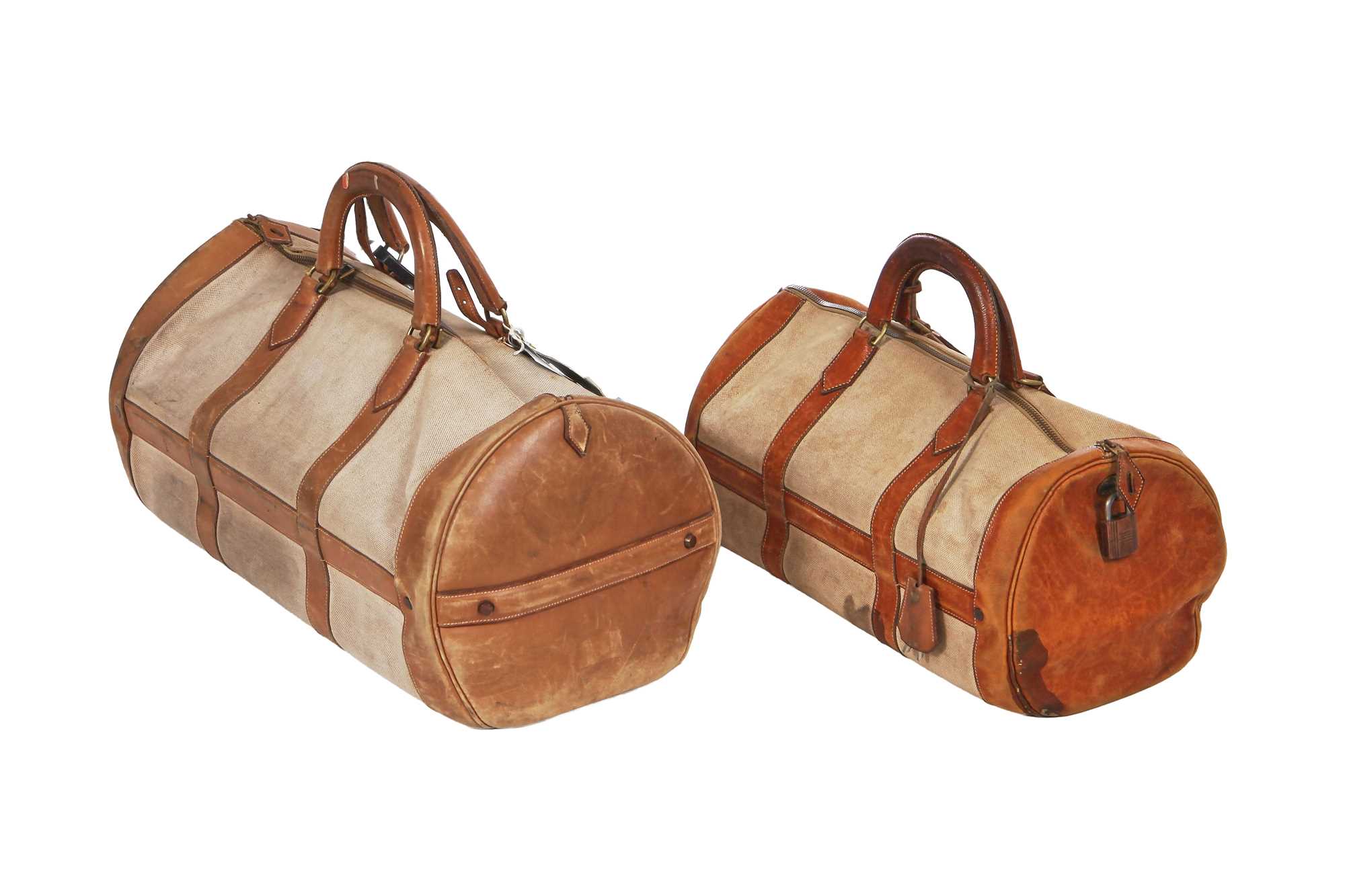Lot 94 - Two Hermès canvas and leather travel/overnight bags, 1960s