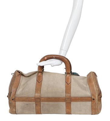 Lot 94 - Two Hermès canvas and leather travel/overnight bags, 1960s