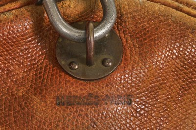 Lot 94 - Two Hermès canvas and leather travel/overnight bags, 1960s