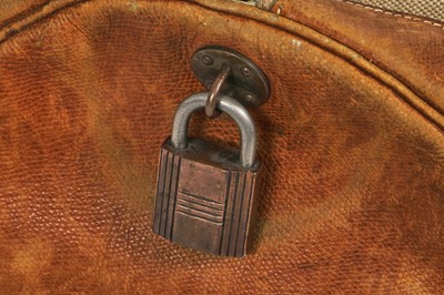 Lot 94 - Two Hermès canvas and leather travel/overnight bags, 1960s