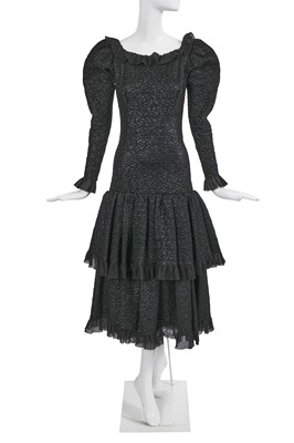 Lot 383 - An Yves Saint Laurent haute couture black ciré and cloqué silk evening dress, early 1980s
