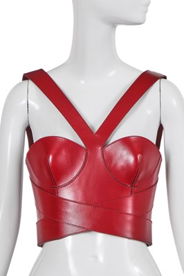 Lot 101 - An Alexander McQueen by Sarah Burton red leather bustier, circa 2019