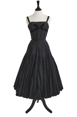 Lot 500 - A Christian Dior haute couture black silk cocktail dress, probably Autumn-Winter 1951-52