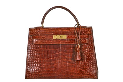 Lot 93 - An Hermès Miel Crocodile Kelly 32, 1988