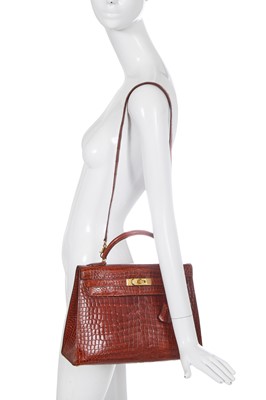 Lot 93 - An Hermès Miel Crocodile Kelly 32, 1988