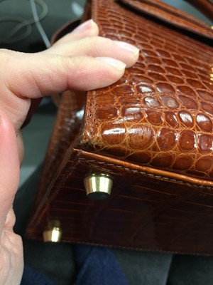 Lot 93 - An Hermès Miel Crocodile Kelly 32, 1988