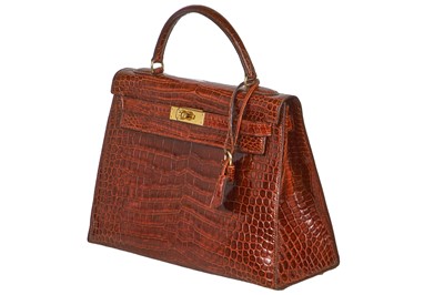 Lot 93 - An Hermès Miel Crocodile Kelly 32, 1988