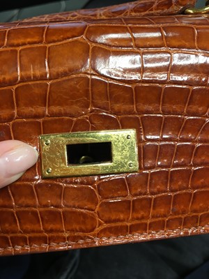 Lot 93 - An Hermès Miel Crocodile Kelly 32, 1988