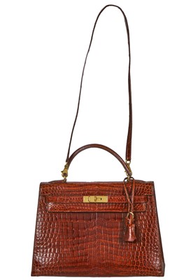 Lot 93 - An Hermès Miel Crocodile Kelly 32, 1988