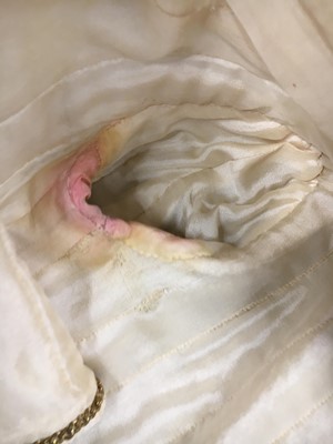 Lot 64 - A Gabrielle Chanel haute couture cream bouclé suit, late 1960s