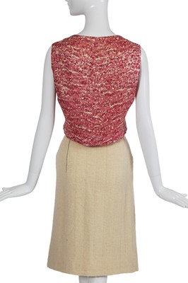 Lot 64 - A Gabrielle Chanel haute couture cream bouclé suit, late 1960s