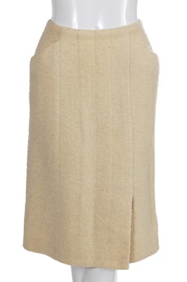 Lot 64 - A Gabrielle Chanel haute couture cream bouclé suit, late 1960s