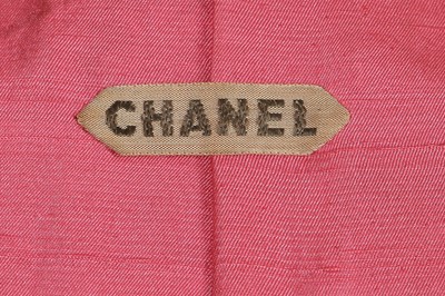 Lot 69 - A Gabrielle Chanel haute couture embroidered silk skirt suit, 1959