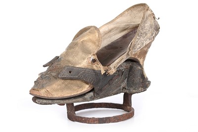 Lot 375 - An embroidered silk shoe with matching wood...