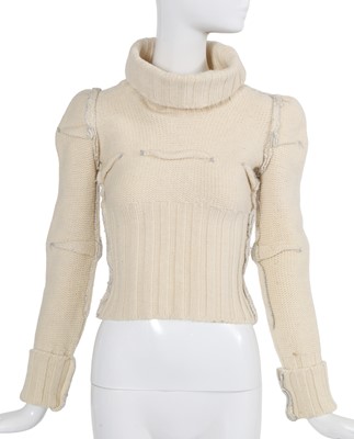 Lot 215 - A rare and important Maison Martin Margiela knitted white wool sweater, Autumn-Winter 1990-91