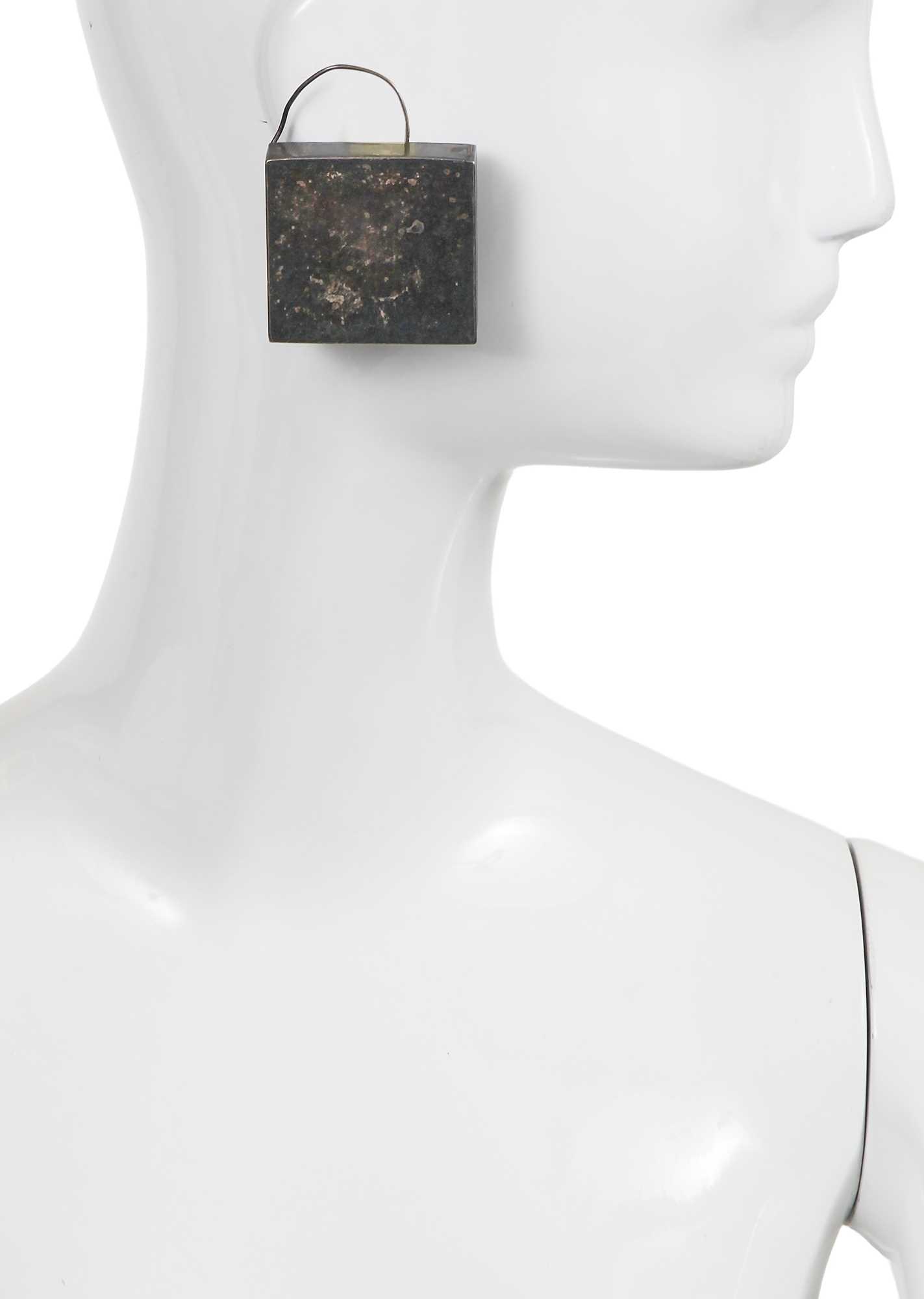 Lot 78 - A pair of Madame Grès by Robert Goossens patinated metal earrings, circa 1960