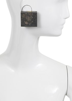 Lot 78 - A pair of Madame Grès by Robert Goossens patinated metal earrings, circa 1960