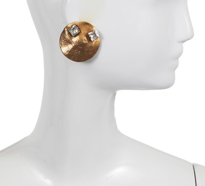 Lot 75 - A pair of Madame Grès by Robert Goossens hammered and textured bronze earrings, 1969