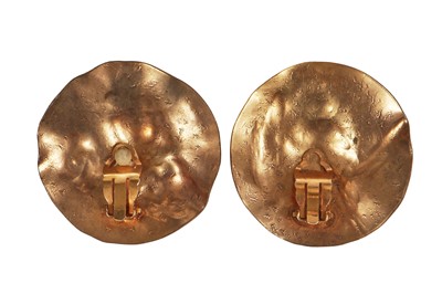 Lot 75 - A pair of Madame Grès by Robert Goossens hammered and textured bronze earrings, 1969