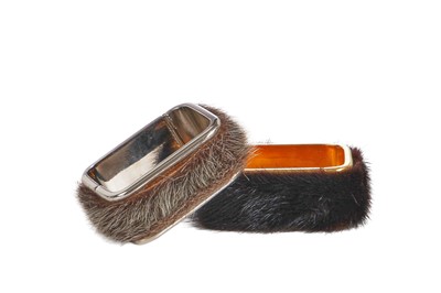 Lot 82 - A pair of Madame Grès metal and fur cuffs, 1960s