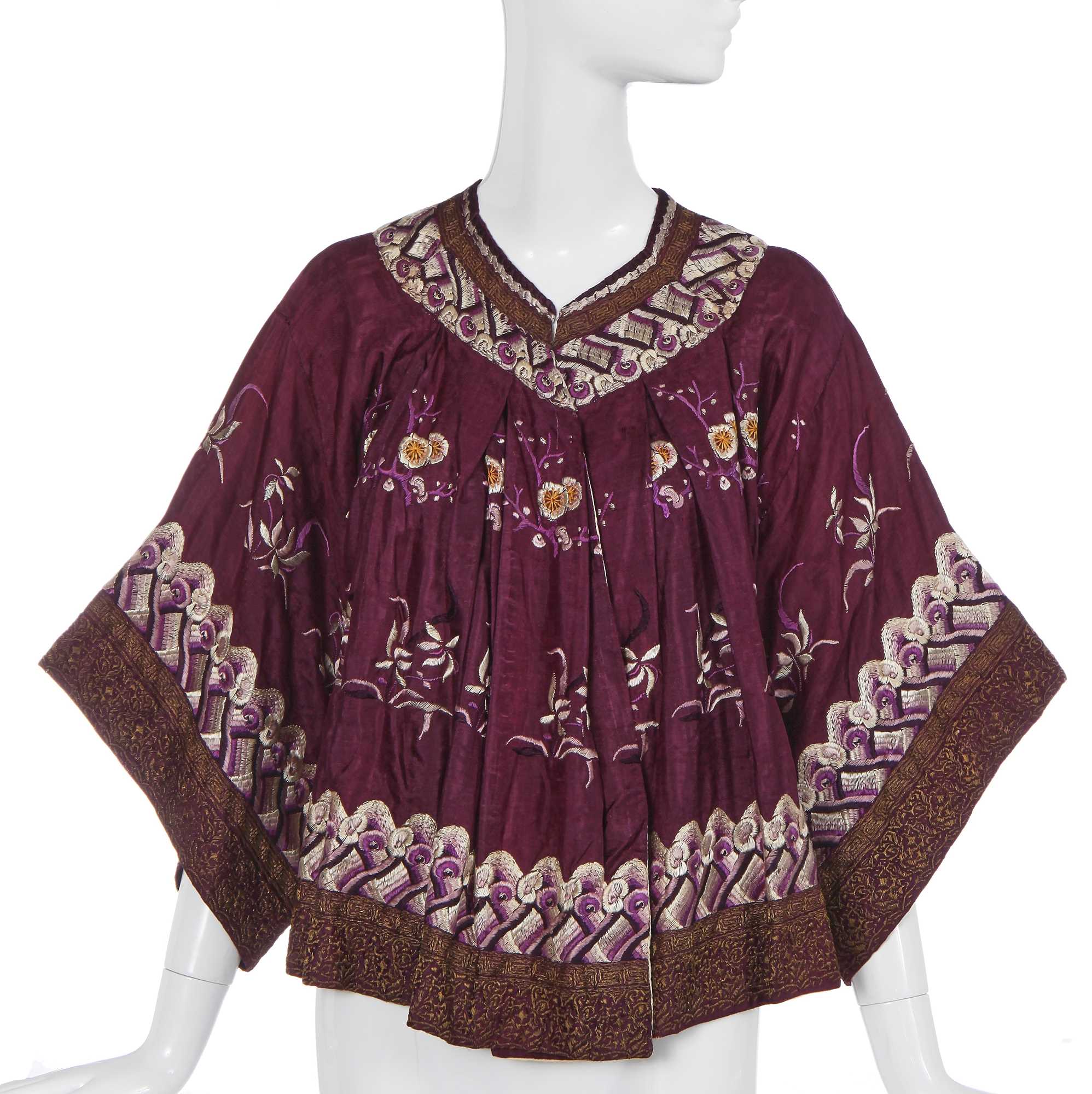 Lot 534 - A rare Babani embroidered purple silk 'Niu