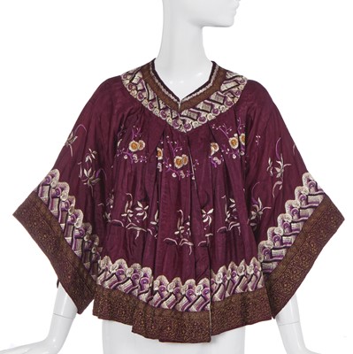 Lot 534 - A rare Babani embroidered purple silk 'Niu Tsé' jacket, circa 1906