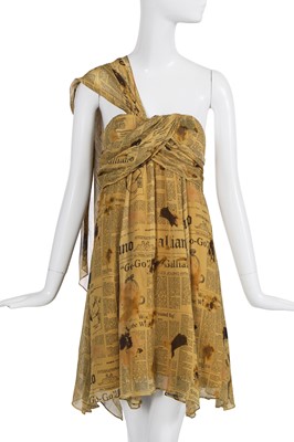 Lot 159 - A John Galliano newspaper print mini dress, circa 2005