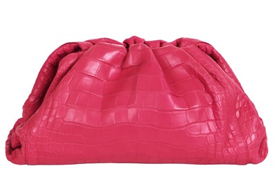 Lot 97 - A Bottega Veneta pink crocodile 'Pouch' clutch, 2019