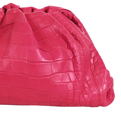 Lot 97 - A Bottega Veneta pink crocodile 'Pouch' clutch, 2019