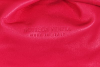 Lot 97 - A Bottega Veneta pink crocodile 'Pouch' clutch, 2019