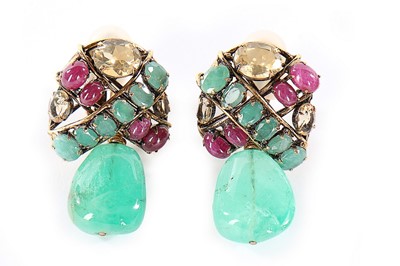 Lot 100 - An Iradj Moini raw emerald, facetted raw ruby...