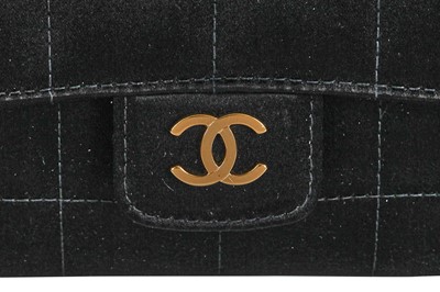 Lot 25 - A Chanel by Karl Lagerfeld black silk mini camellia classic flap shoulder bag, 2003-04