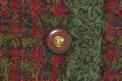 Lot 56 - A Chanel haute couture by Philippe Guibourgé green and red tweed suit, Autumn-Winter 1978-79