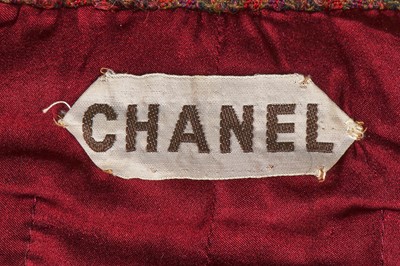 Lot 56 - A Chanel haute couture by Philippe Guibourgé green and red tweed suit, Autumn-Winter 1978-79