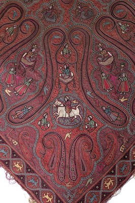 Lot 446 - An embroidered figurative shawl, Indian or...