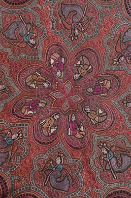 Lot 446 - An embroidered figurative shawl, Indian or...