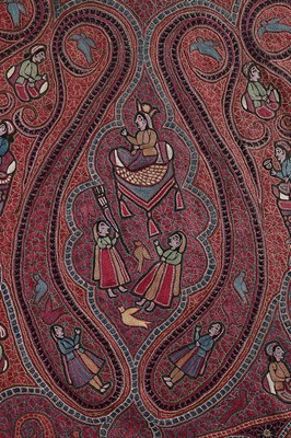 Lot 446 - An embroidered figurative shawl, Indian or...