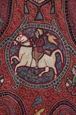 Lot 446 - An embroidered figurative shawl, Indian or...