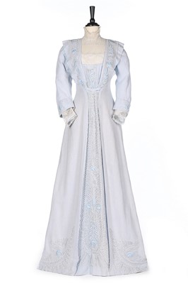 Lot 389 - A pale blue cotton summer dress, 1905-10, with...