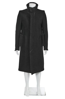 Lot 28 - A Carol Christian Poell men's black wool-ramie blend 'one-piece' coat, 'Dead End' collection, 2010