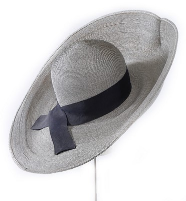 Lot 68 - A Philip Treacy wide-brimmed silver straw hat,...