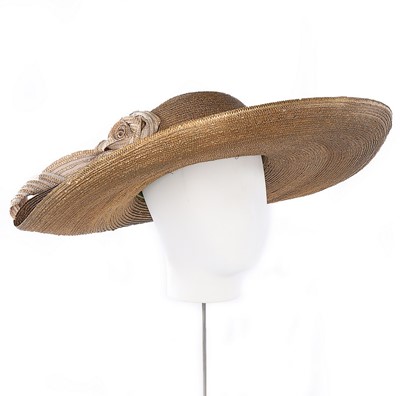Lot 68 - A Philip Treacy wide-brimmed silver straw hat,...
