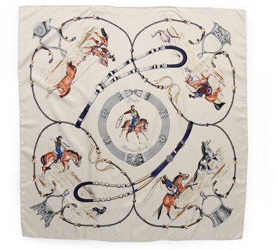 Lot 143 - Four Hermès equestrian-themed silk scarves,...