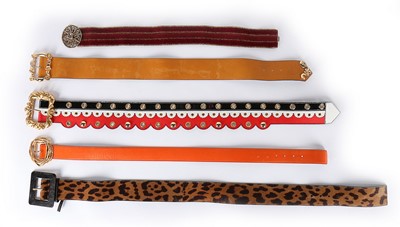 Lot 299 - A group of mostly Yves Saint Laurent belts,...