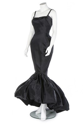 Lot 212 - A fine couture black satin evening gown, circa...